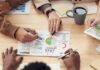 Small Business Strategy: How to Compete in a Crowded Market Small business team planning strategy in a modern office environment